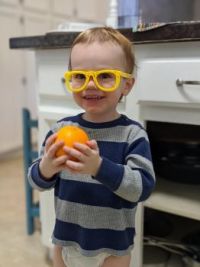 Cole loves oranges... peel and all!