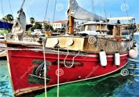 GREEK SAILING YACHT MOORED AT THE MARINA IN LAVRION, GREECE