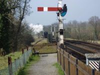 Steam engine and signals on the Bluebell Railway