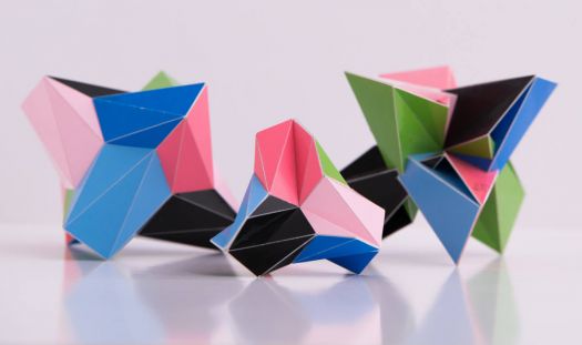 Three Polyhedra with Folded Regular Heptagons