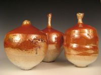 Three Orange Luster Vases (2)