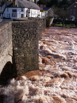 Crickhowell Bridge and river in flood