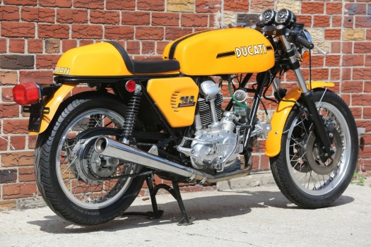 Solve Ducati 750 Yellow Sport jigsaw puzzle online with 504 pieces