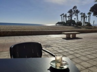 Afternoon cup of coffee at the beach