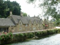 Houses along a brook in the Cotswolds