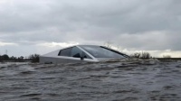 Tesla Cybertruck driving through water