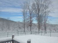 Snowy scene against blue sky