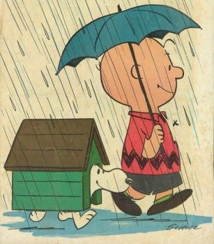 Solve Charlie Brown and Snoopy...staying dry in rain jigsaw puzzle ...