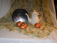 Laquer tray with teapot and onions