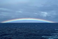 Rainbow at sea off French Polynesia