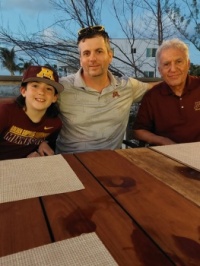 Three generations of University of Minnesota Golden Gopher fans.
