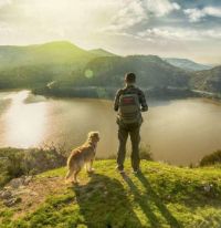 Man-Hiking-With-Dog
