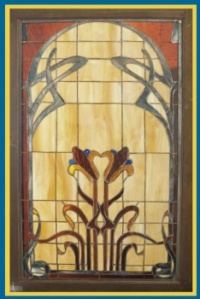 Antique Art Nouveau style stained glass window Frame measures 43.25" x 28.25"