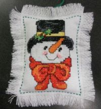 snowman cross stitched ornament
