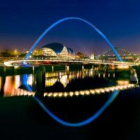 Night view of Gateshead Millennium Bridge in New Castle England