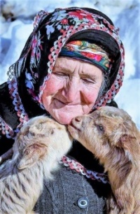 HAPPY GRANDMA AND HER BABY GOATS