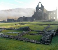 Across the remains of the Inner Court towards Tintern Abbey
