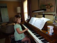 5  yr old Chelsey taking piano