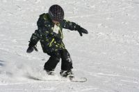Snowboarding grandson