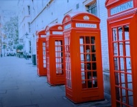A row of red K6 phone boxes in Covent Garden,...