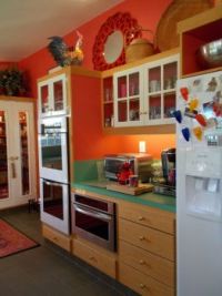 My Red Kitchen: The beverage/snack center between the double oven and the fridge