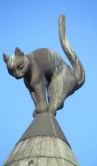 Detail of one of the two bronze cats on the roof of "The Cat House", Riga, Latvia