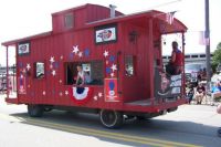 A caboose going down the street