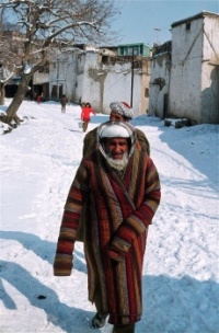 Men in snowy Kabul in the 1970s