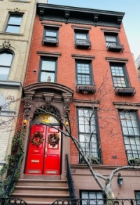 brownstone; red door