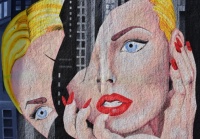 Colorful Graffiti Painting of Blonde Woman with Red Lipstick