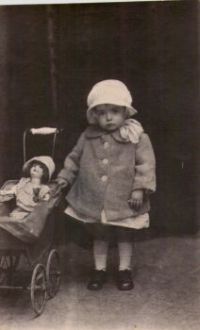 Vintage Photo Of A Little Girl with Doll In A Buggy
