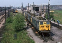 BR Class 76 76038 with a weekend line of sister locos, stabled at Wath Shed, 20th. May 1978.