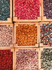 top-view-of-assorted-colored-stones-in-wooden-containers-2734616