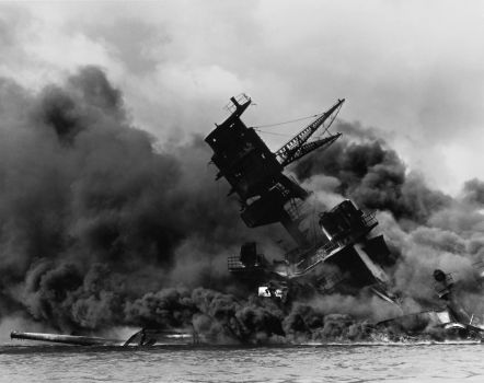 The USS Arizona (BB-39) burning after the Japanese attack on Pearl Harbor