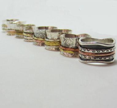 silver, brass and copper rings