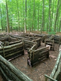 A maze made of small logs... Yes, of course I climbed on it 🥳🤣.