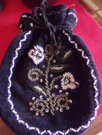 Velvet purse with embroidered pearls