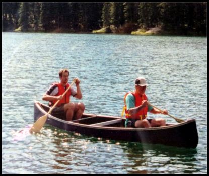 My husband and son canoeing in Johnson Lake, Banff