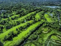 aerial view of trees and golf course