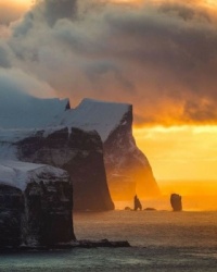 Distant Sunset In Faroe Island.   7558
