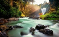 Tegenungan Waterfall morning jungle river Indonesia
