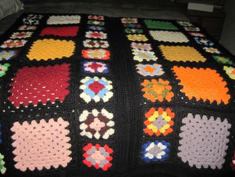 Crochet granny square afghan.