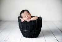 Baby Sleeping In Black planter