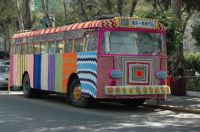Yarn bombing a bus in Mexico City
