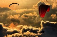 paragliding above the clouds