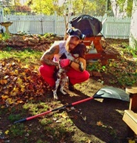 Willow helping Danyer rake leaves