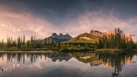 The Three Sisters, a trio of iconic peaks located near Canmore, Alberta, Canada.