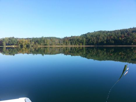 fishing on the mirrored lake