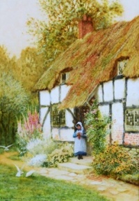 A girl by cottage door