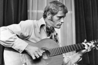 When You're Hot, You're Hot Musician and actor Jerry Reed sporting some top-notch 70's sideburns and fashion.